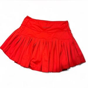 Gold hinge pleated tennis skirt